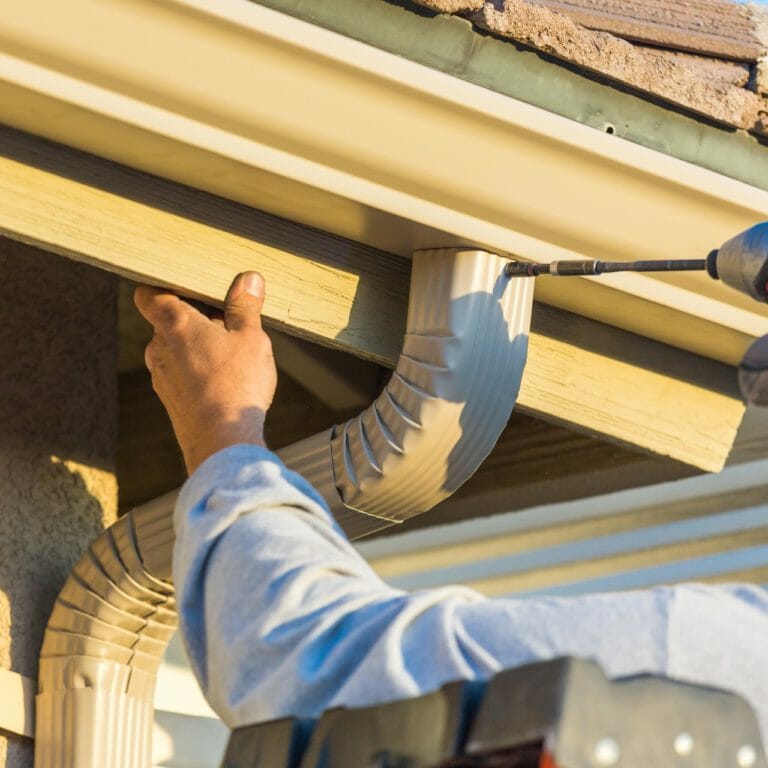 new gutter being installed on home