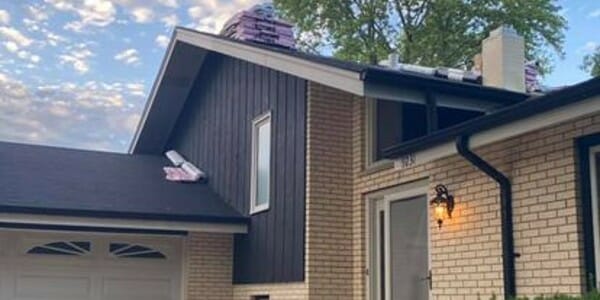 New Fascia board being installed on home